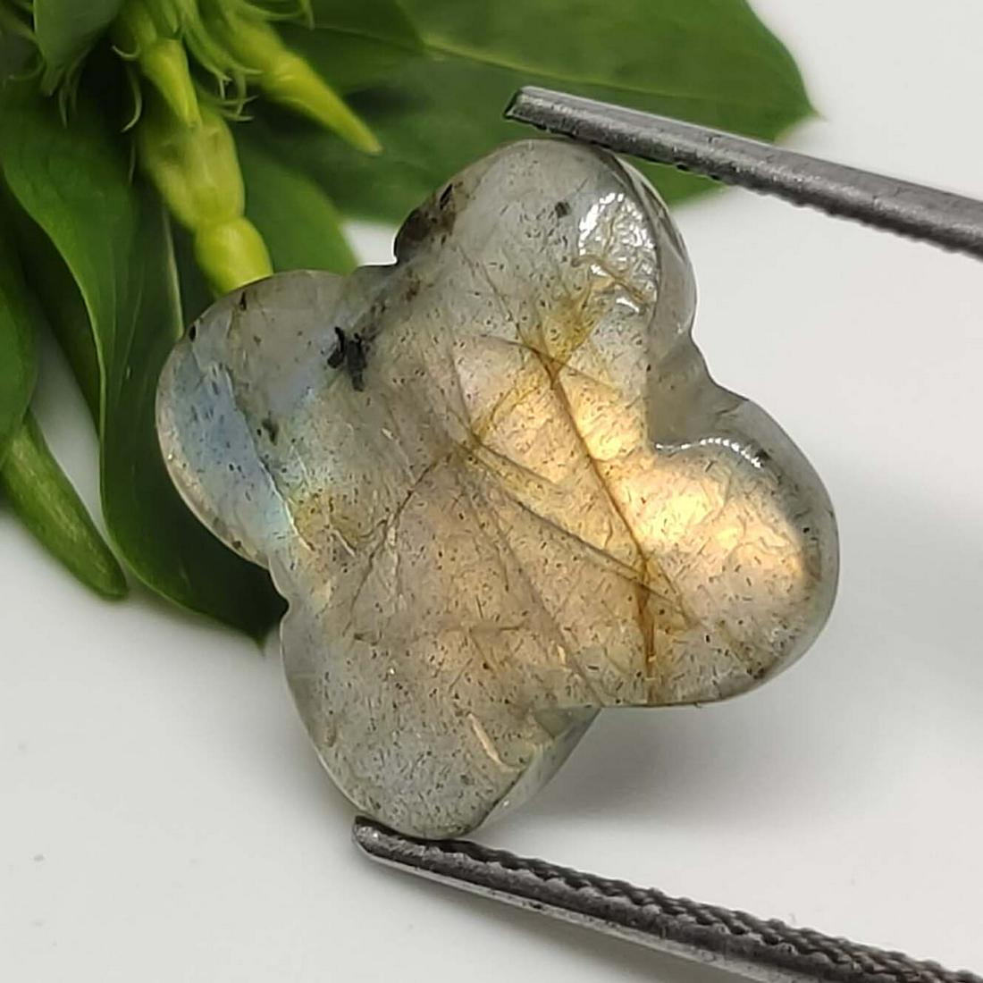 8.15 ct Natural Faceted Labradorite Star: No Reserve! Title: 8.15 ct Natural Faceted Labradorite Star Additional Information: Gemstones: Labradorite Carat Weights: 8.15 ct Size/Dimensions: 13 x 13 mm Origin : India Materials & Techniques: Lab