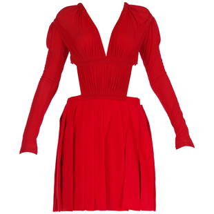 VERSUS VERSACE + Christopher Kane red cut-out dress: VERSACE VERSUS + Christopher Kane Cut-out dress For a seductive dress that packs a punch, turn to Versus Versace. This dress has long sleeve design, cut-outs and plisse detail. Made in Italy IT Size: