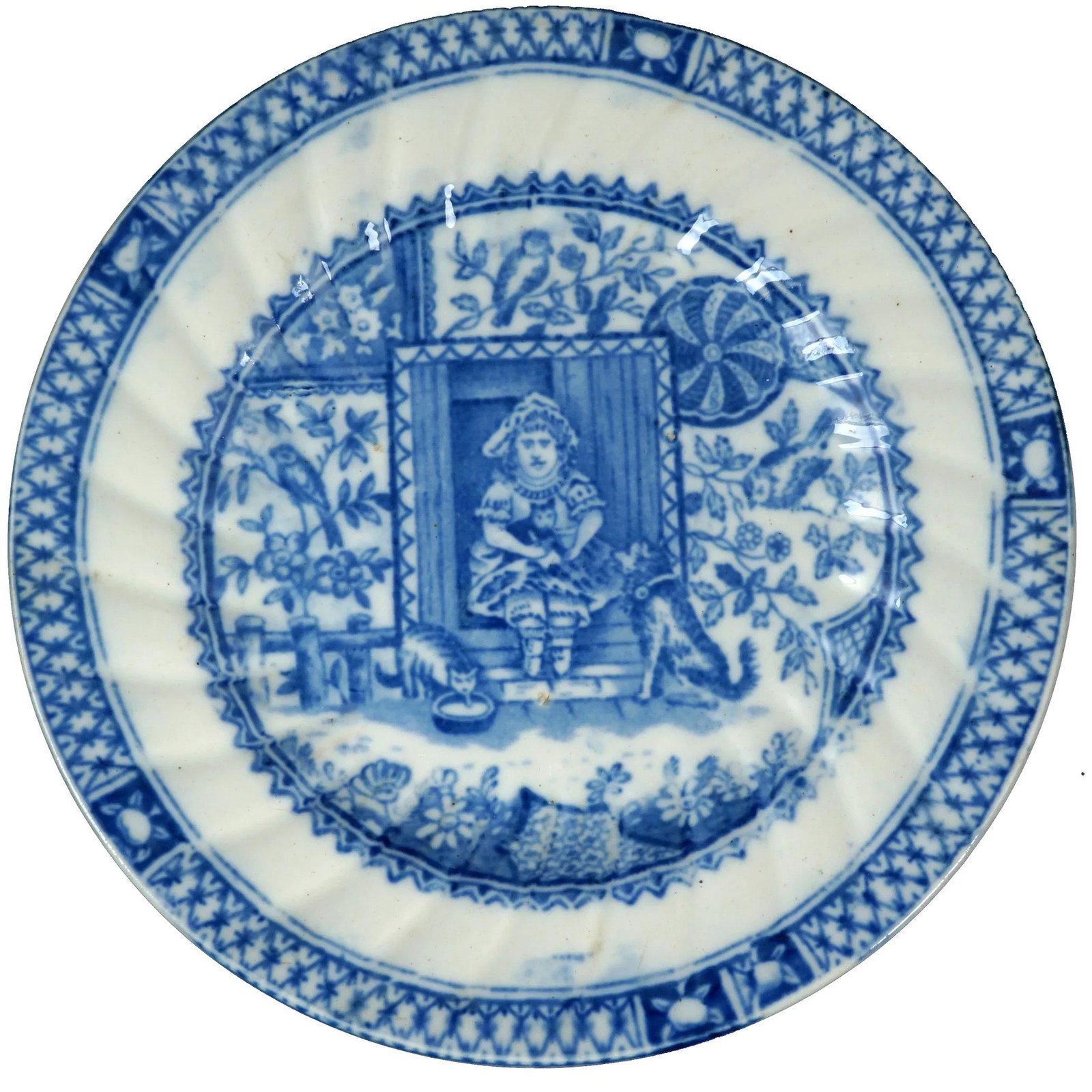 19th C Staffordshire Little Mae Child’s Plate: Title: 19th C Staffordshire Little Mae Childâ€™s Plate Size: 6 ¾” (17.1 cm) diameter x 3/8” (.8 cm) tall. Description: A large molded childâ€™s plate with little Mae at th