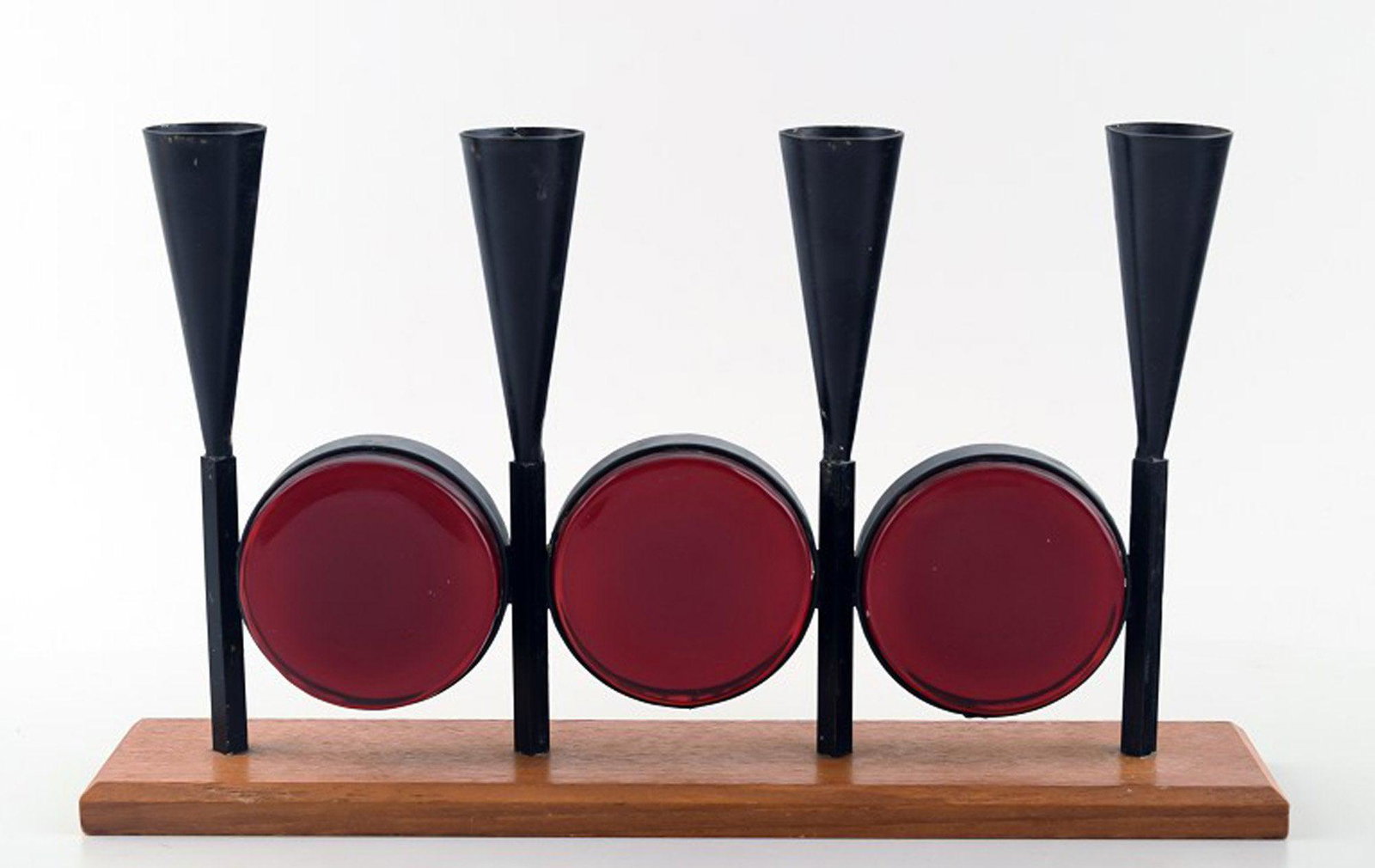 Erik Höglund, candlestick in cast iron with hand-blown glass. (1 of 3)