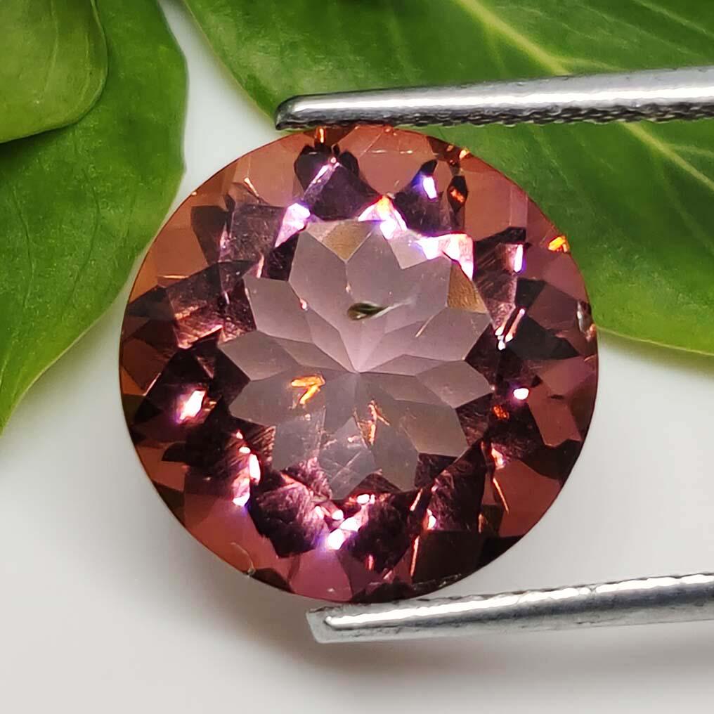 5.40 ct Rare Natural Counter Intuitive Mystic Quartz: No Reserve! Title: 5.40 ct Rare Natural Counter Intuitive Mystic Quartz Additional Information: Gemstones: Natural Mystic Quartz Carat Weights: 5.40 ct Size/Dimensions: 12 X 12 X 7 mm Treatment: Coate