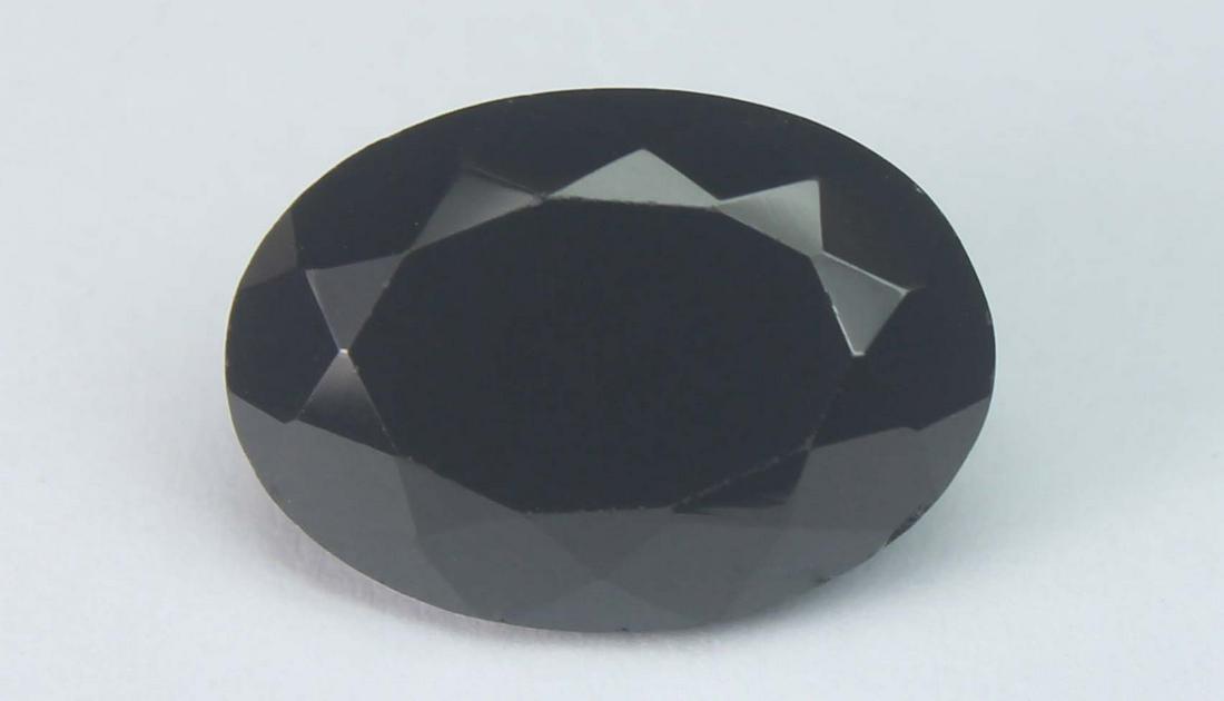 7.63 Cts Natural Black Spinel: No Reserve! Title: 7.63 Cts Natural Black Spinel Additional Information: Gemstone : Natural Black Spinel Shape and cut : Oval Cut Origin : Africa Weight : 7.63 carats Measurements : (5x5) Calibrated m