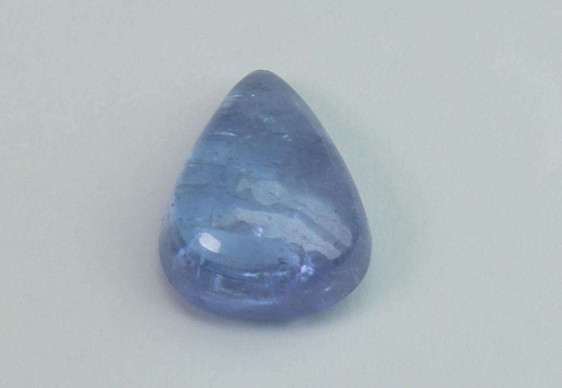 1.84 Cts Natural Tanzanite: No Reserve! Title: 1.84 Cts Natural Tanzanite Additional Information: Gemstone : Natural Tanzanite Origin: Tanzania Weight : 1.84 carats Dimensions : 9x7 mm Shape/Cut: Pear Cabochon Color : Violet Tra