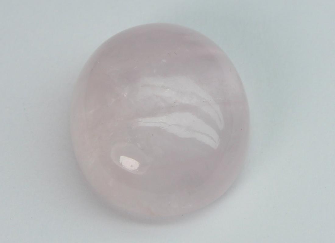 9.27 cts Natural Morganite: No Reserve! Title: 9.27 cts Natural Morganite Additional Information: Gemstone : Natural Morganite Shape and Cut : Oval Cabochon Weight : 9.27 carats Measurements : 14.85x12.48x6.42 mm Color : Peach T
