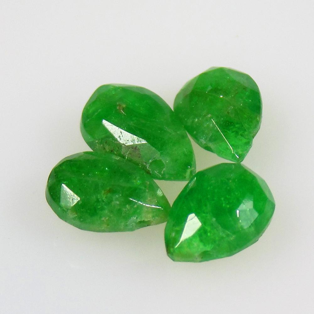 3.56 Ctw Natural 4 Tsavorite garnet Drilled Pear Beads: No Reserve! Title: 3.56 Ctw Natural 4 Tsavorite garnet Drilled Pear Beads Stone Clarity: Opaque Gemstones: Natural Tsavorite Beads Carat Weights: 3.56 Size/Dimensions: 6.6x4.8 - 7.8x4.7 mm / 4 Pc's Ad