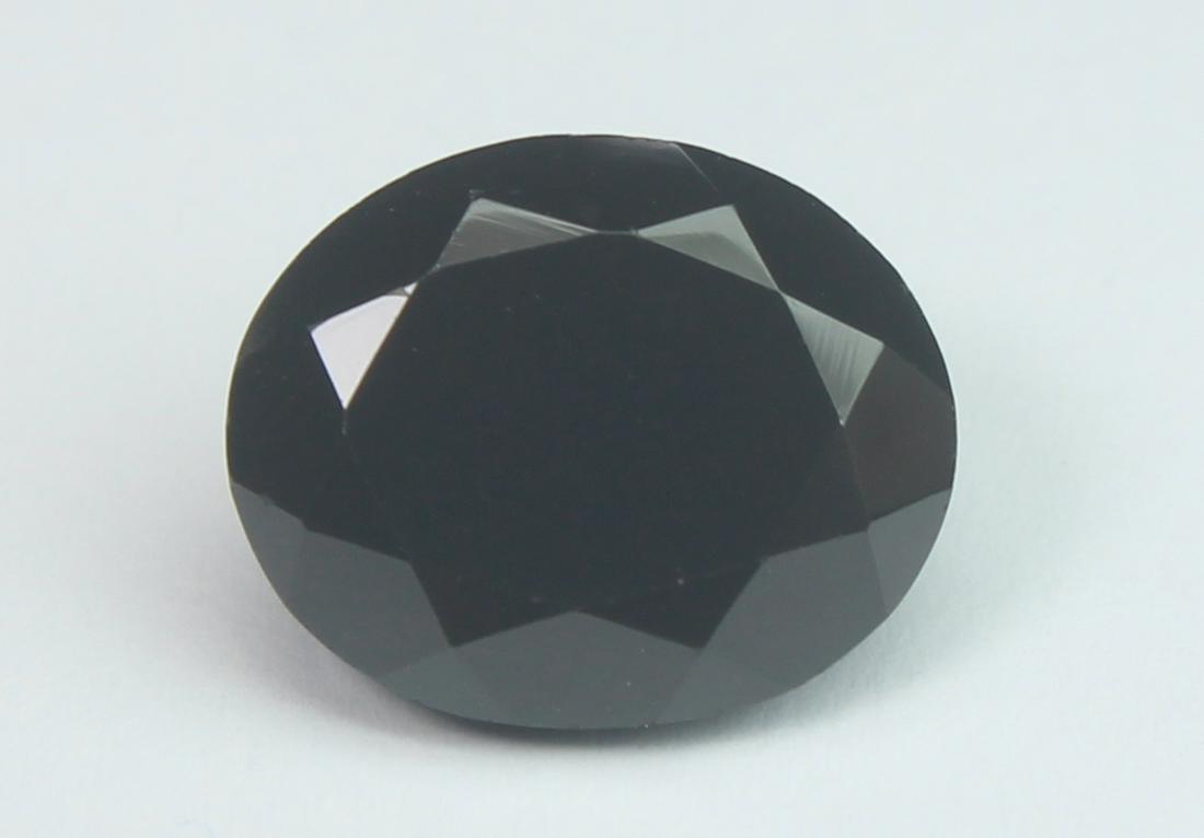 5.88 Cts Natural Black Spinel: No Reserve! Title: 5.88 Cts Natural Black Spinel Additional Information: Gemstone : Natural Black Spinel Shape and cut : Oval Cut Origin : Africa Weight : 5.88 carats Measurements : 11.89x9.70x6.21 mm