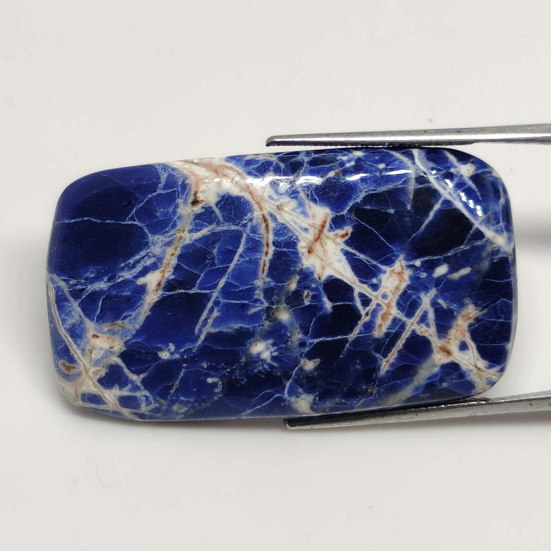 28.50 ct Natural Sodalite: No Reserve! Title: 28.50 ct Natural Sodalite Additional Information: Gemstones: Sodalite Carat Weights: 28.50 ct Size/Dimensions: 36 X 21 X 5 mm Materials & Techniques: Sodalite Shipping: Domestic: Fl