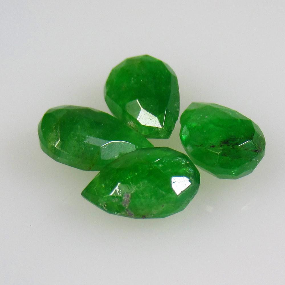 3.83 Ctw Natural 4 Tsavorite garnet Drilled Pear Beads: No Reserve! Title: 3.83 Ctw Natural 4 Tsavorite garnet Drilled Pear Beads Stone Clarity: Opaque Gemstones: Natural Tsavorite Beads Carat Weights: 3.83 Size/Dimensions: 7.6x4.8 - 7.9x4.9 mm / 4 Pc's Ad