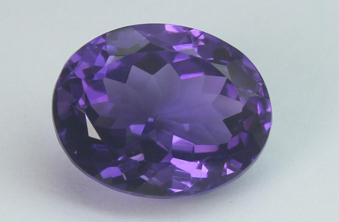 10.14 Cts Natural Amethyst Lot: No Reserve! Title: 10.14 Cts Natural Amethyst Lot Additional Information: Gemstone : Natural Amethyst Origin: Brazil Weight : 10.14 carats Dimensions : 15.32x12.17x9.26 mm Shape/Cut: Oval Cut Color : 