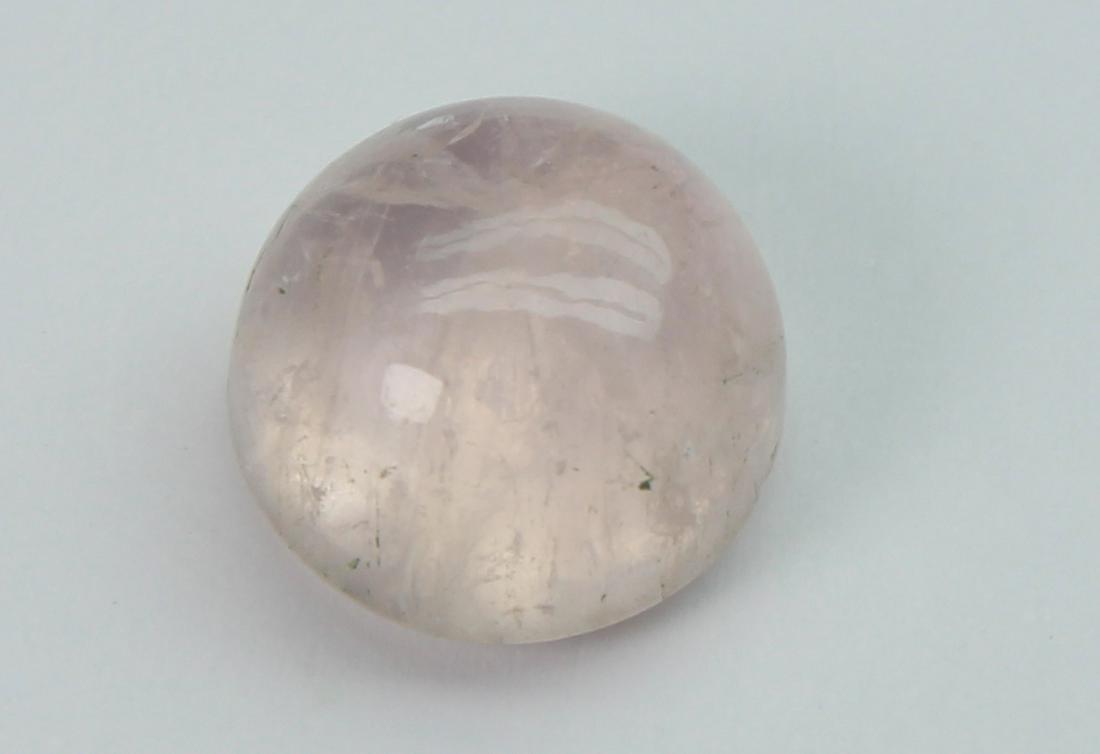 4.33 cts Natural Morganite: No Reserve! Title: 4.33 cts Natural Morganite Additional Information: Gemstone : Natural Morganite Shape and Cut : Round Cabochon Weight : 4.33 carats Measurements : 9.62-9.59x6.04 mm Color : Peach Tr