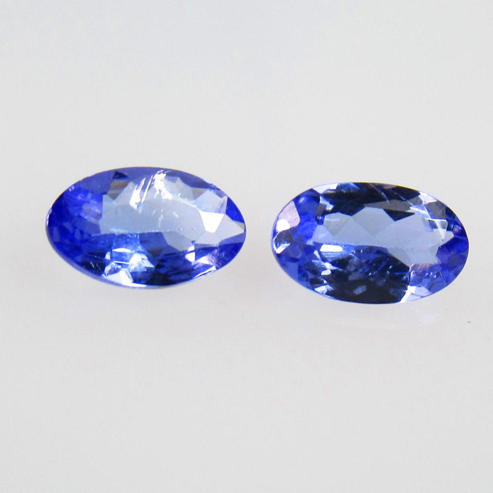 0.43 Ctw Natural Tanzanite Oval Pair: No Reserve! Title: 0.43 Ctw Natural Tanzanite Oval Pair Stone Clarity: VVS Gemstones: Natural Tanzanite Carat Weights: 0.43 Size/Dimensions: 5.10 x 3.10 x 2.00 mm / 2 Pc's Additional Information: Top 