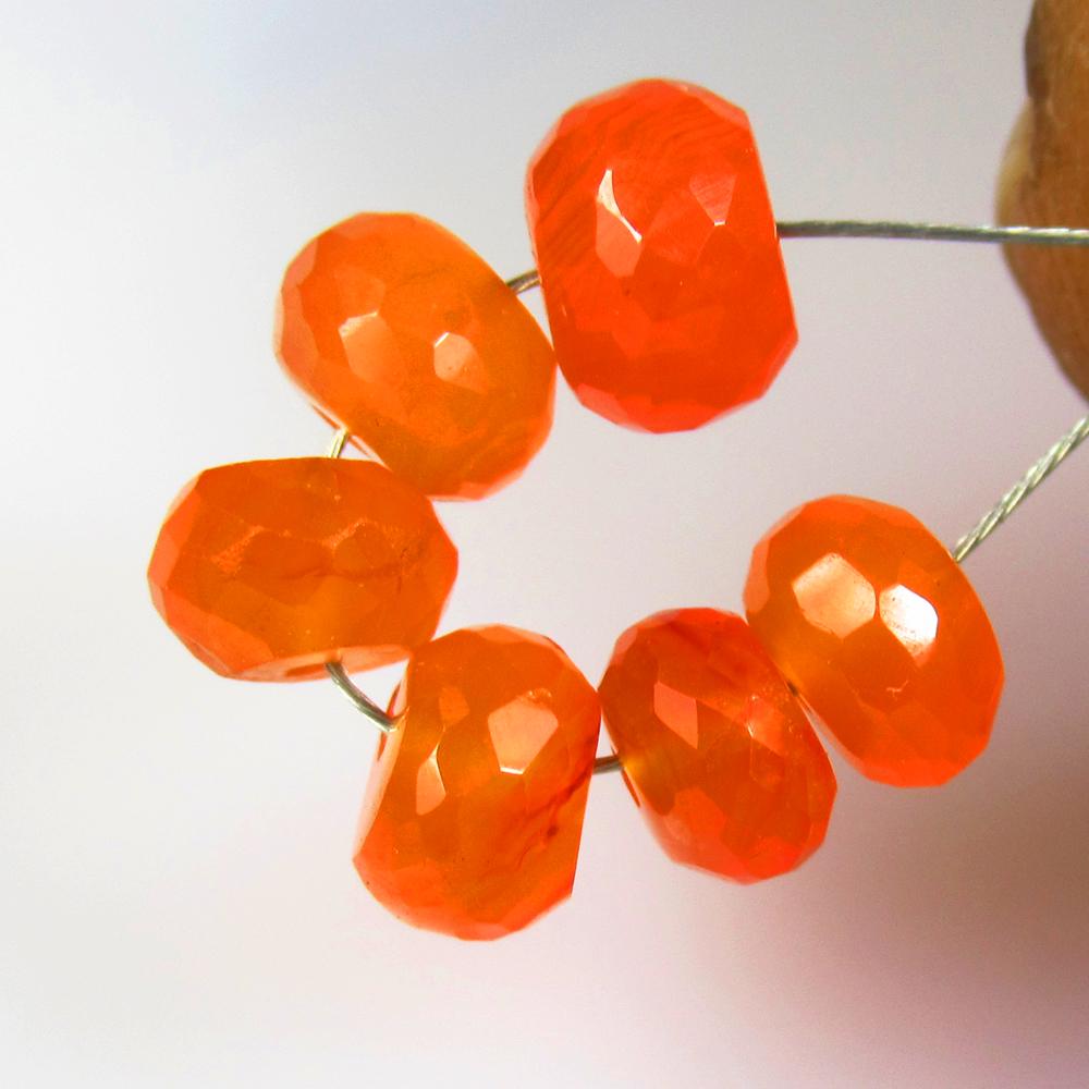 5.63 Ctw Natural 6 Drilled Orange Carnelian Round Beads: No Reserve! Title: 5.63 Ctw Natural 6 Drilled Orange Carnelian Round Beads Stone Clarity: Semi-Transparent Gemstones: Natural Carnelian Beads Carat Weights: 5.63 Size/Dimensions: 5.60 - 6.70 mm / 6 Pc