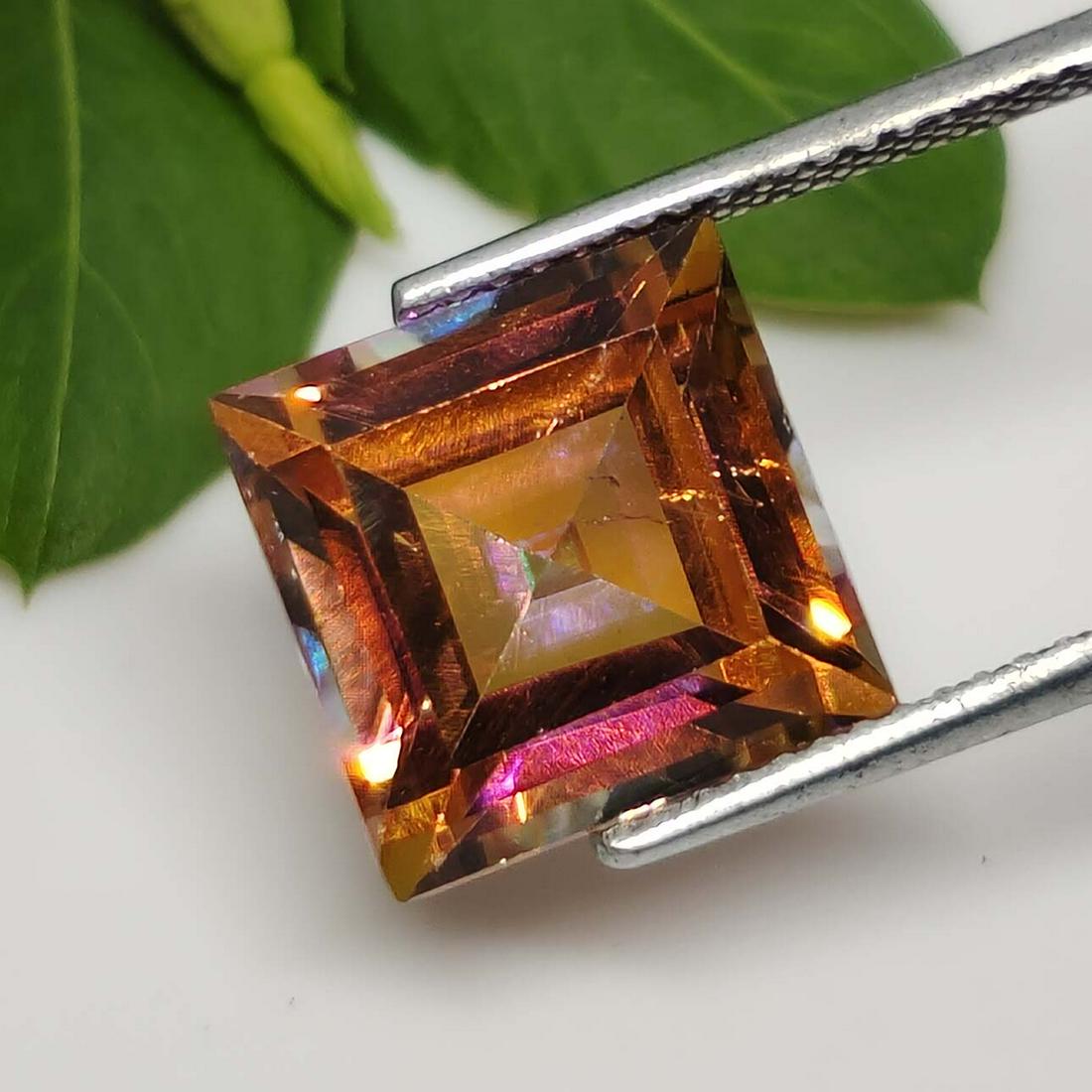 6.50 ct Rare Natural Ecstasy Mytic Topaz-Top Grade: No Reserve! Title: 6.50 ct Rare Natural Ecstasy Mytic Topaz-Top Grade Additional Information: Gemstones: Natural Mystic Topaz Carat Weights: 6.50 ct Size/Dimensions: 10 X 10 mm Treatment: Coated Mater