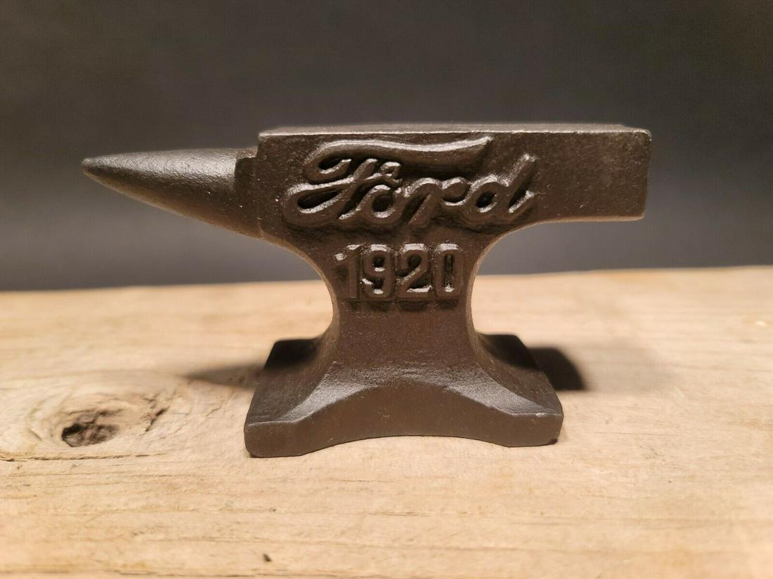 Cast Iron Ford Miniature Anvil: 4 3/4" long x 2 1/2" Tall x 1 3/4" Wide 1 lb. 5 oz. A wonderful reproduction cast iron collectible advertising Ford. Advertising pieces like this many times were given to shops or used as sales sample