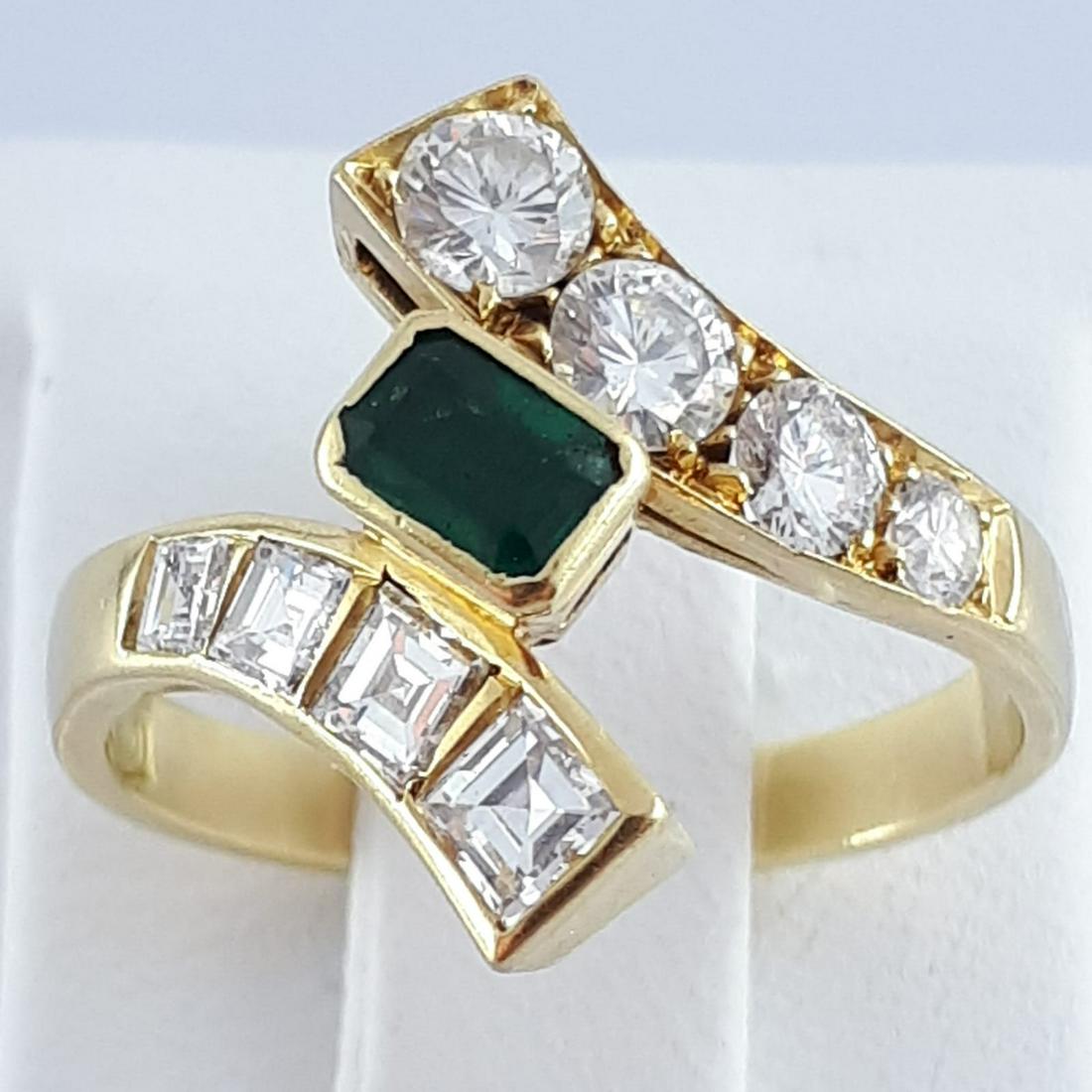 18K Yellow Gold - Ring: Ring Gender : Women Material : 18K Yellow Gold DIAMOND; Total 1.20 ct 4 Bagette Cut Diamonds, 0.60 ct , VVS Clarity, G Color 4 Brilliants, 0.60 ct , VVS Clarity, G Color EMERAL