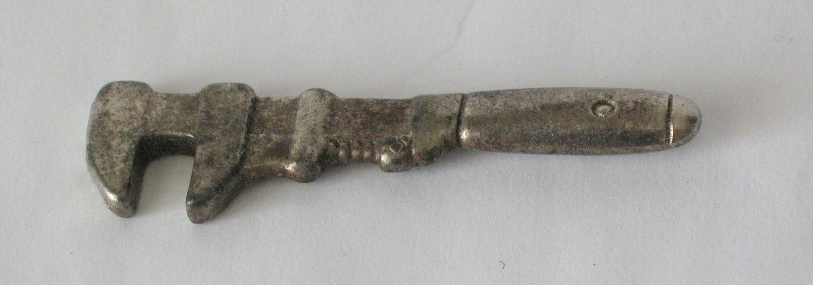 Vintage cast iron monkey wrench paper weight. (1 of 2)