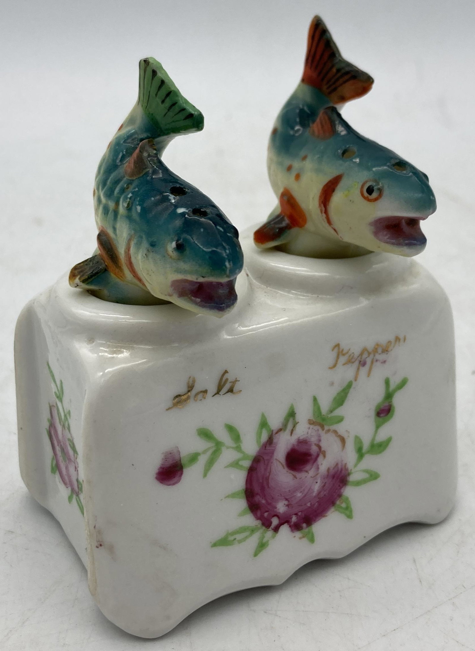FISH TROUT NODDER SALT & PEPPER Japan: Title: FISH TROUT NODDER SALT & PEPPER Japan Date/Period: unknown Dimension: approx 3.25" tall x 3 x 1 Materials: ceramic Additional Information: VINTAGE T.T. PATENT JAPAN FISH TROUT NODDER SALT & PEP