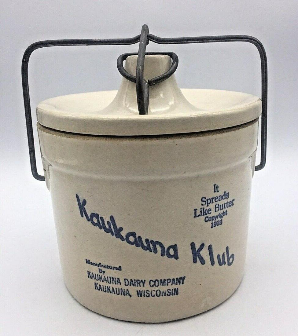 VINTAGE STONEWARE CROCK WITH LID ADVERTISING KAUKAUNA KLUB WISCONSIN: Title: VINTAGE STONEWARE CROCK WITH LID ADVERTISING KAUKAUNA KLUB WISCONSIN Date/Period: UNKNOWN Dimension: APPROX 6 X 6 Materials: STONEWARE BALE HANDLE Additional Information: VINTAGE STONEWARE CROC