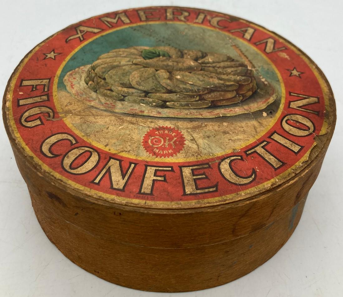 American Fig Confections Wood Shaker Box: Title: American Fig Confections Wood Shaker Box Date/Period: Early 1900's Dimension: approx 6.5" diameter x 2.5" tall Materials: wood Additional Information: Old packaging. Great wooden shaker box wit