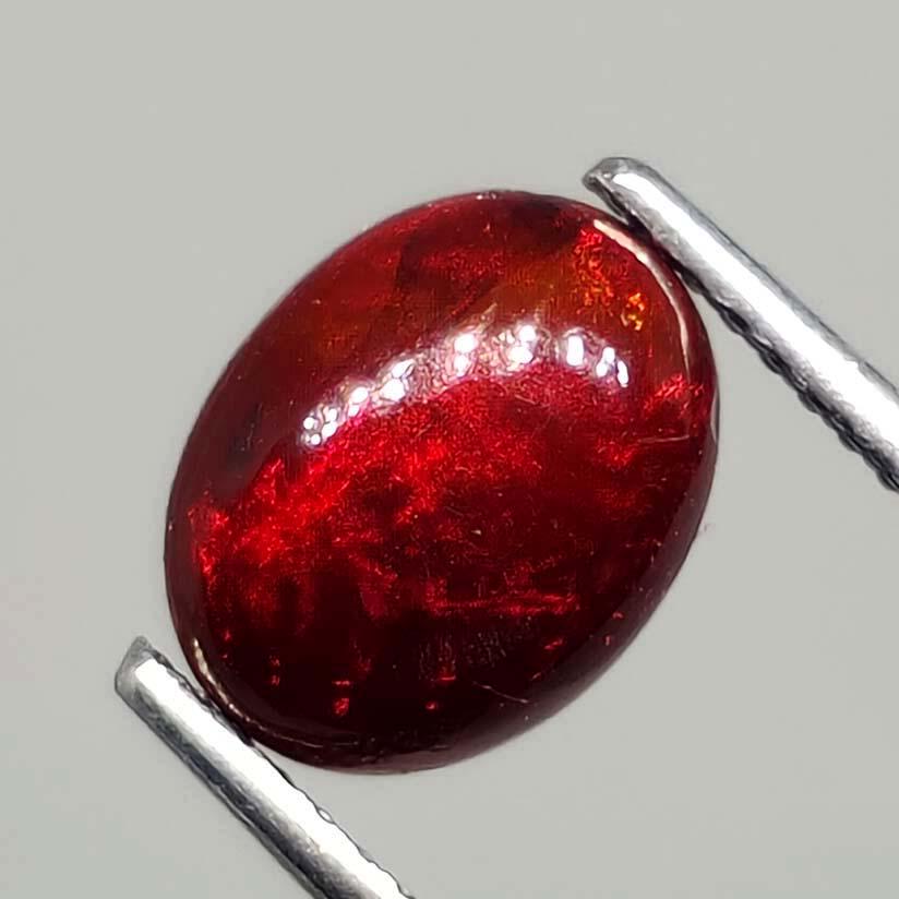 1.35 ct Natural Ethiopian Red Fire Opal: No Reserve! Title: 1.35 ct Natural Ethiopian Red Fire Opal Additional Information: Gemstones: Ethiopian Opal Carat Weights: 1.35 ct Size/Dimensions: 9 X 7 mm Treatment: Dyed Shipping: Domestic: Flat-r