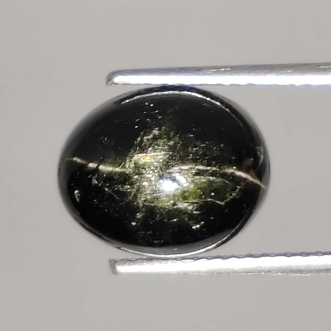 5 ct Natural Star Diopside: No Reserve! Title: 5 ct Natural Star Diopside Additional Information: Gemstones: Star Diopside Carat Weights: 5 ct Size/Dimensions: 11 X 8 X 5 mm Treatment: Colorless Oil Materials & Techniques: Diops