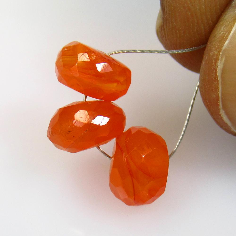 7.00 Ctw Natural 3 Drilled Orange Carnelian Round Beads: No Reserve! Title: 7.00 Ctw Natural 3 Drilled Orange Carnelian Round Beads Stone Clarity: Semi-Transparent Gemstones: Natural Carnelian Beads Carat Weights: 7 Size/Dimensions: 7.70 - 8.00 mm / 3 PC's 