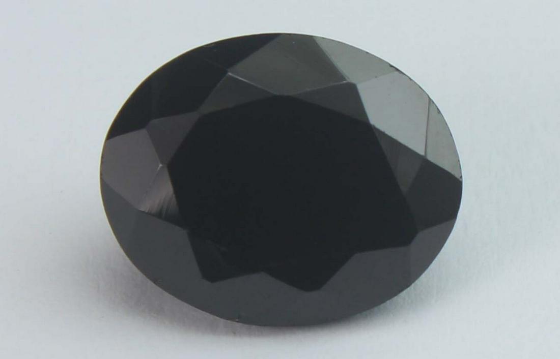4.80 Cts Natural Black Spinel: No Reserve! Title: 4.80 Cts Natural Black Spinel Additional Information: Gemstone : Natural Black Spinel Shape and cut : Oval Cut Origin : Africa Weight : 4.80 carats Measurements : 11x9 mm , Color : 