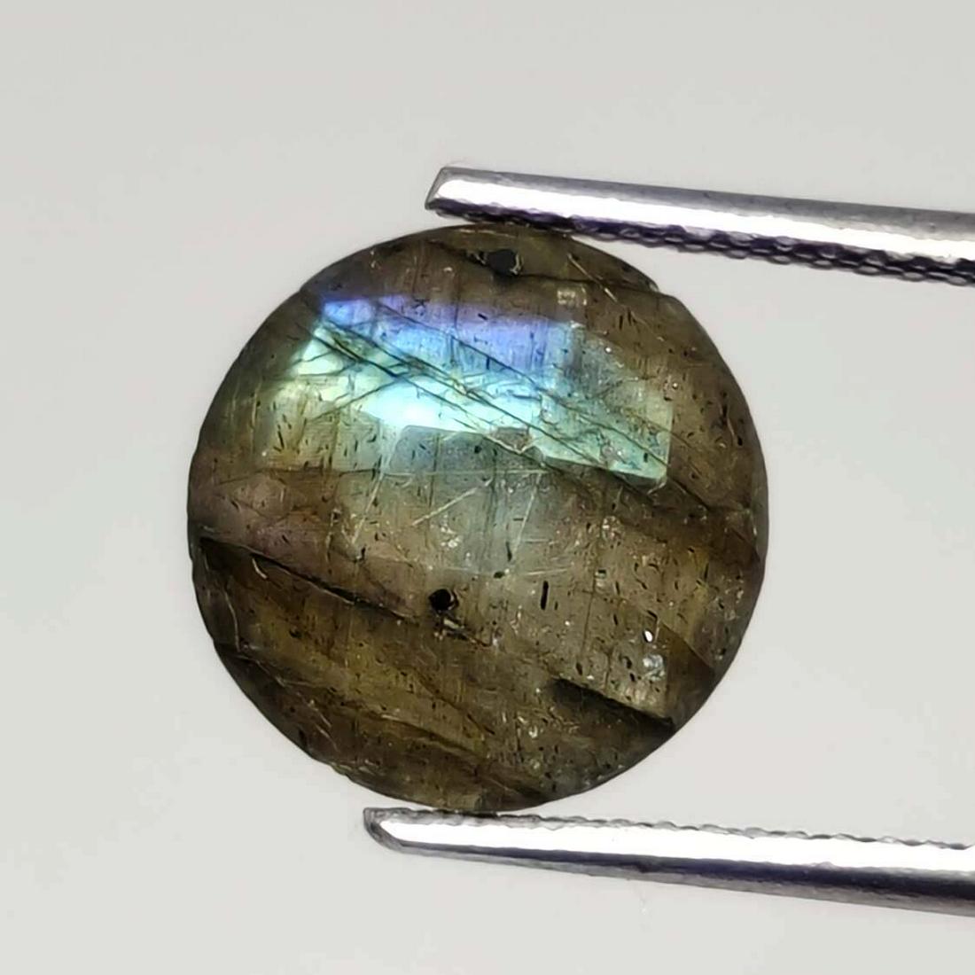 3.45 ct Natural Faceted Labradorite: No Reserve! Title: 3.45 ct Natural Faceted Labradorite Additional Information: Gemstones: Labradorite Carat Weights: 3.45 ct Size/Dimensions: 10 X 10 mm Origin : Labrador Materials & Techniques: Labra