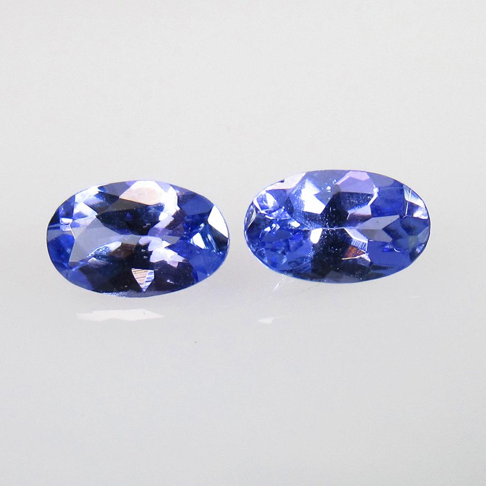 0.52 Ctw Natural Tanzanite Oval Pair: No Reserve! Title: 0.52 Ctw Natural Tanzanite Oval Pair Stone Clarity: VVS Gemstones: Natural Tanzanite Carat Weights: 0.52 Size/Dimensions: 5.10 x 3.30 x 2.30 mm / 2 Pc's Additional Information: Top 