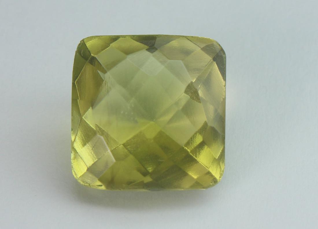 7.49 cts Natural Lemon Quartz: No Reserve! Title: 7.49 cts Natural Lemon Quartz Additional Information: Gemstone: Natural Lemon Quartz Origin: Africa Weight : 7.49 carats Measurements: 11.57-11.41x7.92 mm Shape / Cut : Square Cut C