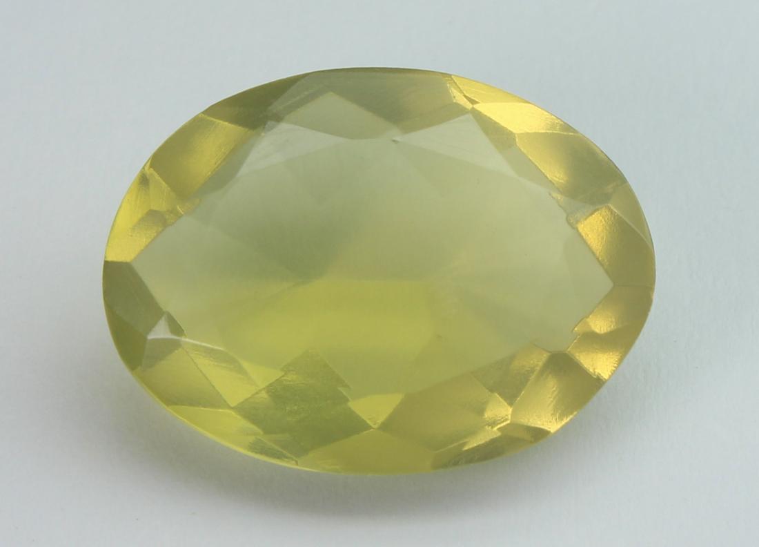 9.64 cts Natural Lemon Quartz: No Reserve! Title: 9.64 cts Natural Lemon Quartz Additional Information: Gemstone: Natural Lemon Quartz Origin: Africa Weight : 9.64 carats Measurements: 17.32x12.89x6.95 mm Shape / Cut : Oval Cut Col
