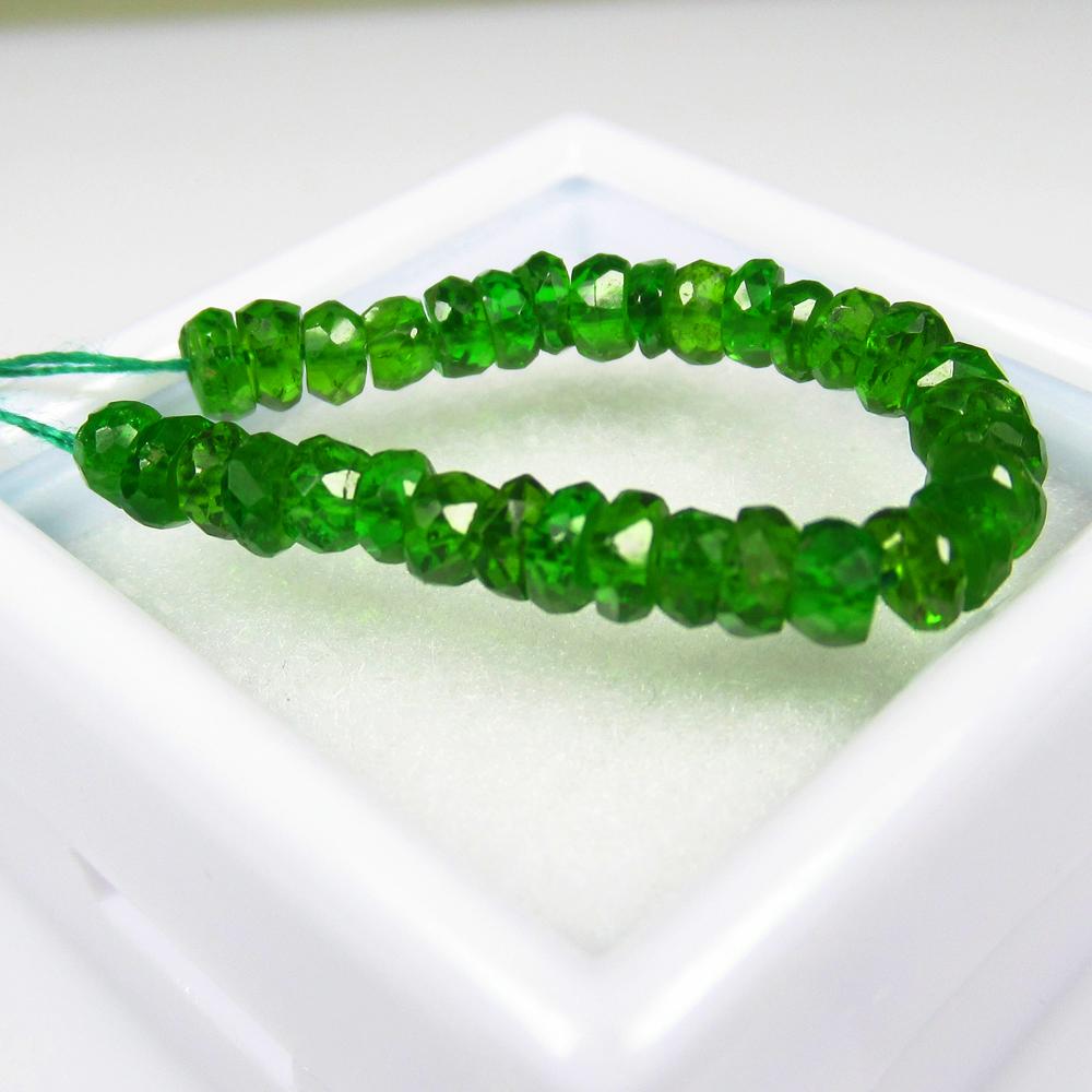 Natural Chrome diopside Beads - 5.15 Ct: No Reserve! Title: Natural Chrome diopside Beads - 5.15 Ct Origin: Russia Weight: 5.15 Size/Dimensions: 3 - 3.3 mm Additional Information: Pieces : 33 No's / Shape : Round Drilled / Color : Green / Cl