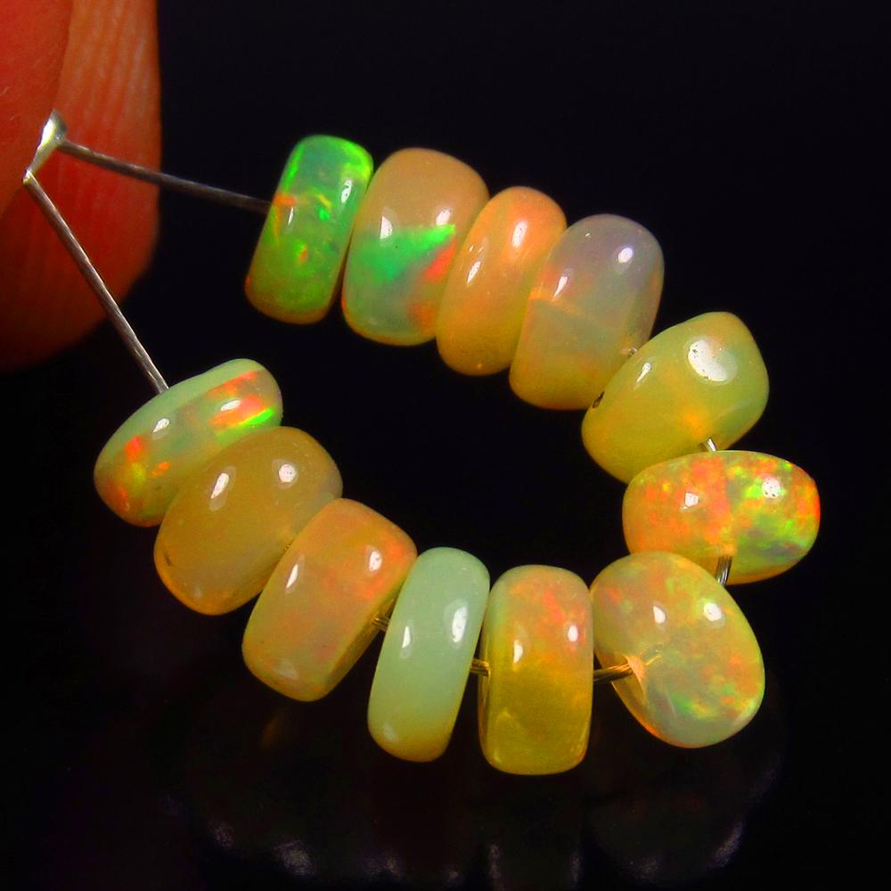 Natural Multicolor Opal Beads - 3.30 Ct: No Reserve! Title: Natural Multicolor Opal Beads - 3.30 Ct Origin: Ethiopia Weight: 3.3 Size/Dimensions: 4.8 - 5.3 mm Additional Information: Pieces : 12 No's / Shape : Drilled Round Beads / Clarity :