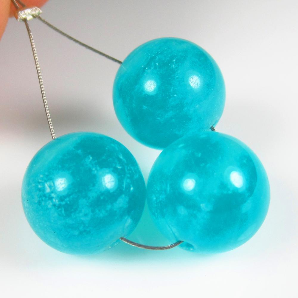 Natural Amazonite Beads - 20.61 Ct: No Reserve! Title: Natural Amazonite Beads - 20.61 Ct Origin: Brazil Weight: 20.61 Size/Dimensions: 11.0 x 11.0 mm Additional Information: Pieces : 3 No's / Shape : Round Drilled / Color : Blue / Clar