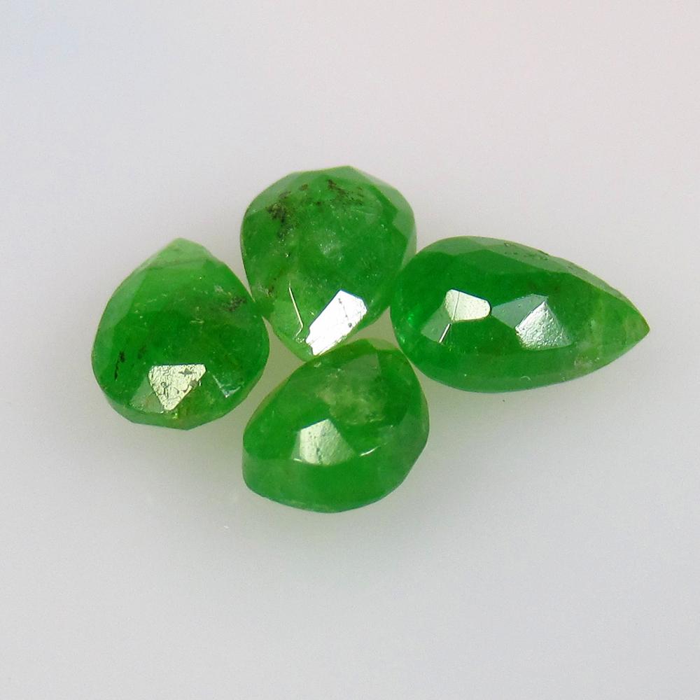 3.85 Ctw Natural 4 Drilled Green Tsavorite Pear Beads: No Reserve! Title: 3.85 Ctw Natural 4 Drilled Green Tsavorite Pear Beads Stone Clarity: Opaque Gemstones: Natural Tsavorite Beads Carat Weights: 3.85 Size/Dimensions: 6.9x5.0 - 7.6x5.2 mm / 4 Pc's Add