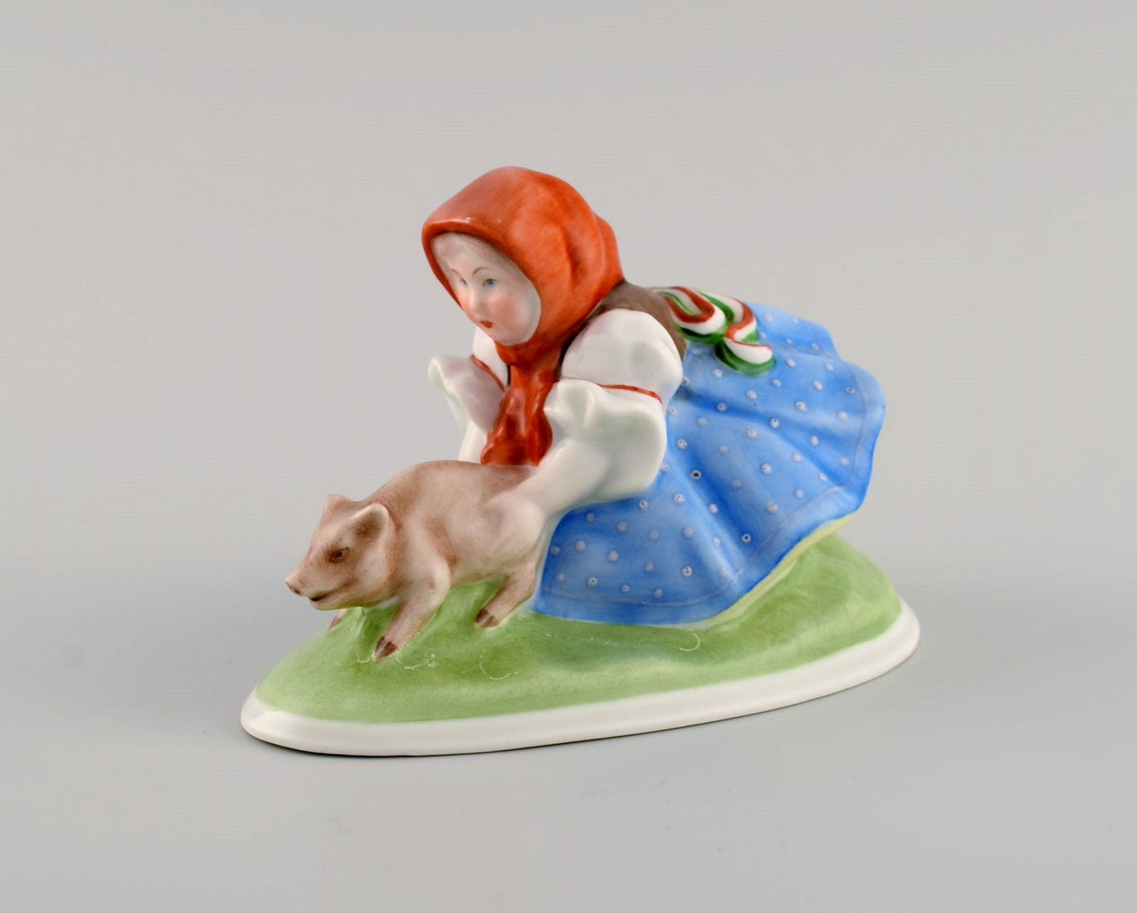 Herend figure in hand-painted porcelain. Peasant girl with piglet. Mid-20th century.: Herend figure in hand-painted porcelain. Peasant girl with piglet. Mid-20th century. Measures: 13.5 x 8.5 cm. In excellent condition. Stamped. Reserve: $119.00 Shipping: Domestic: Shipping rates are d
