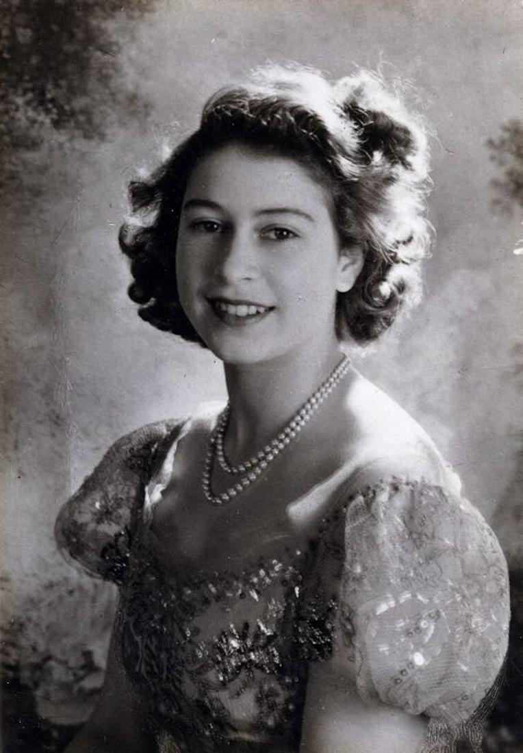 V&A Museum London 'HRH Princess Elizabeth' by Cecil Beaton 1945 (printed later): HRH Princess Elizabeth' by Cecil Beaton (1904-80) Princess Elizabeth, later Queen Elizabeth II, in a Norman Hartnell gown, Buckingham Palace, England, 1945. © Victoria and Albert Museum, London P