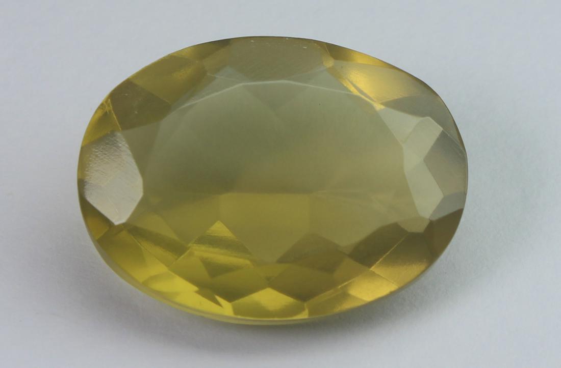 15.85 cts Natural Lemon Quartz: No Reserve! Title: 15.85 cts Natural Lemon Quartz Additional Information: Gemstone: Natural Lemon Quartz Origin: Africa Weight : 15.85 carats Measurements : 20.30x15.17x7.89 mm Shape / Cut : Oval Cut 