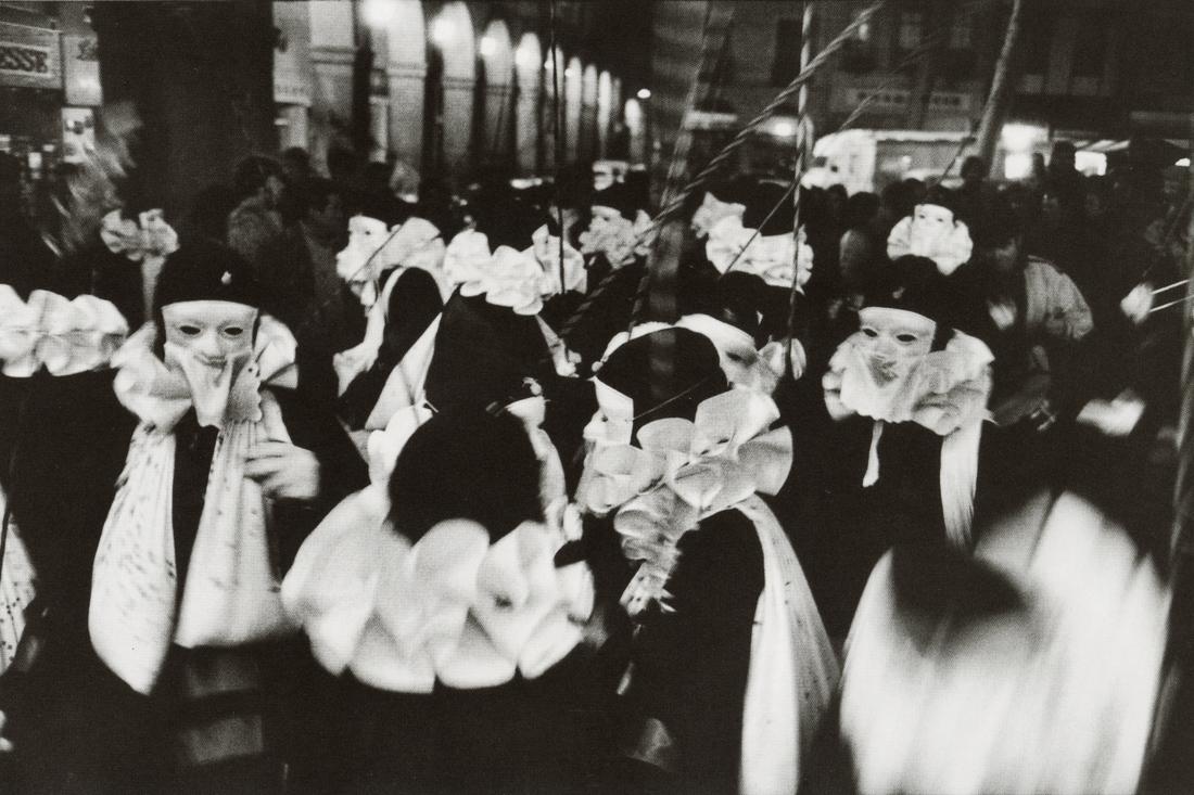 MARTINE FRANCK - Carnival, Limoux, France, 1976: Artist: Martine Franck Title: Carnival, Limoux, France, 1976 Medium: Photo Litho, 2007, Singapore Dimensions: 7x4.65" Description: Heat Wax Mounted on 8.5x11" Conservation Board Artist Bio: Martine Fr