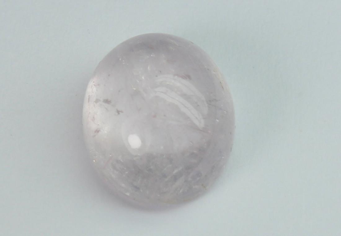 5.33 cts Natural Morganite: No Reserve! Title: 5.33 cts Natural Morganite Additional Information: Gemstone : Natural Morganite Shape and Cut : Oval Cabochon Weight : 5.33 carats Measurements : 11.86x9.65x6.05 mm Color : Peach Tr