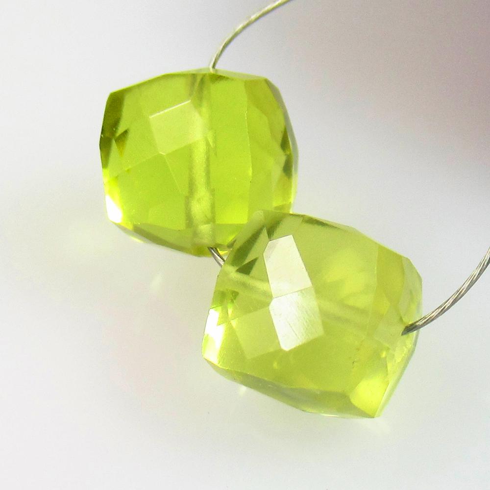 6.56 Ctw Natural 2 Lemon Quartz Drilled Square Beads: No Reserve! Title: 6.56 Ctw Natural 2 Lemon Quartz Drilled Square Beads Stone Clarity: VVS Gemstones: Natural Lemon Quartz Carat Weights: 6.56 Size/Dimensions: 6.8x6.8 - 7.3x7.1 mm / 2 Pc's Additional