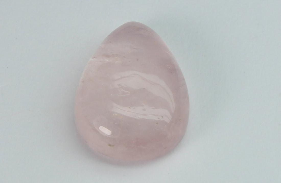 3.75 cts Natural Morganite: No Reserve! Title: 3.75 cts Natural Morganite Additional Information: Gemstone : Natural Morganite Shape and Cut : Pear Cabochon Weight : 3.75 carats Measurements : 12.59x9.15x4.25 mm Color : Peach Tr