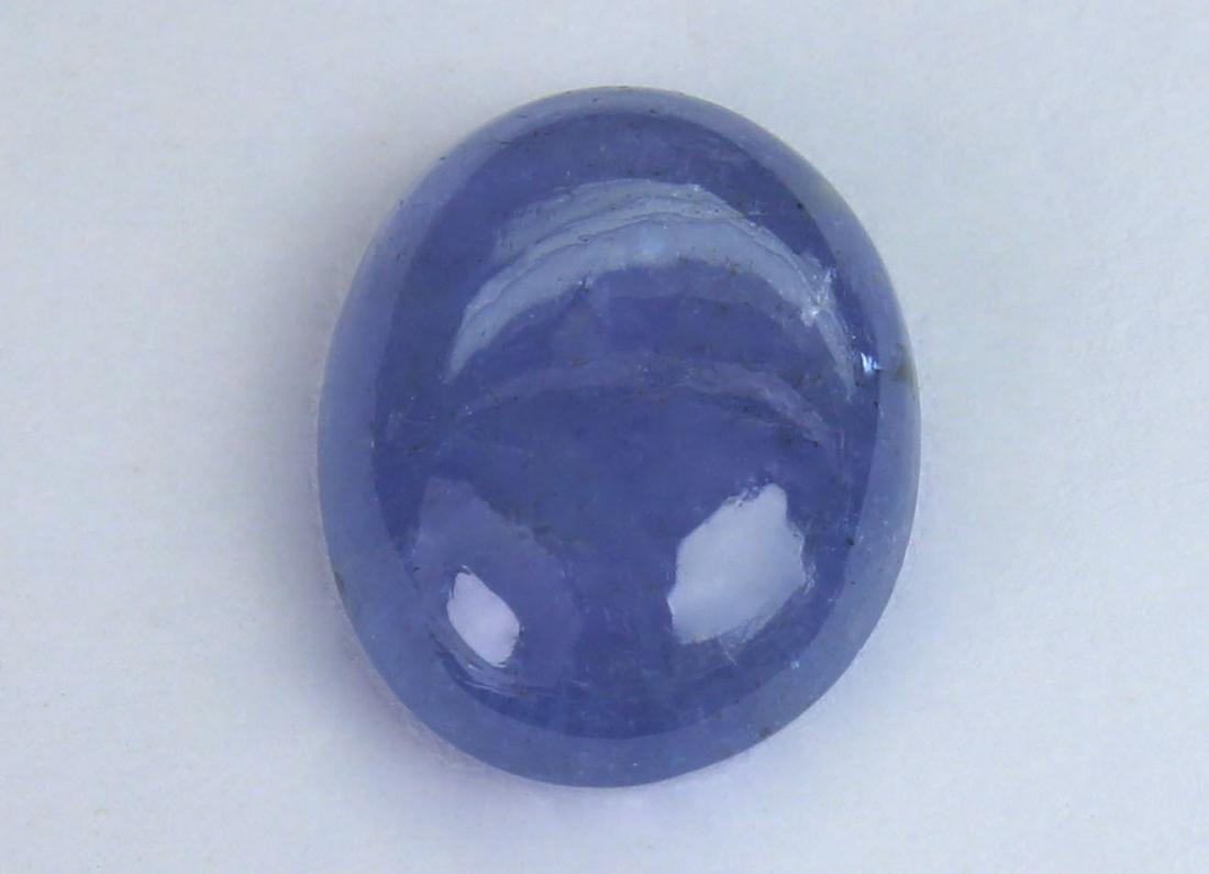 3.05 Cts Natural Tanzanite: No Reserve! Title: 3.05 Cts Natural Tanzanite Additional Information: Gemstone : Natural Tanzanite Shape and cut : Oval Cabochan Weight : 3.05 Carats Measurements : 10.82x8.49x3.58 mm Color : voilite 