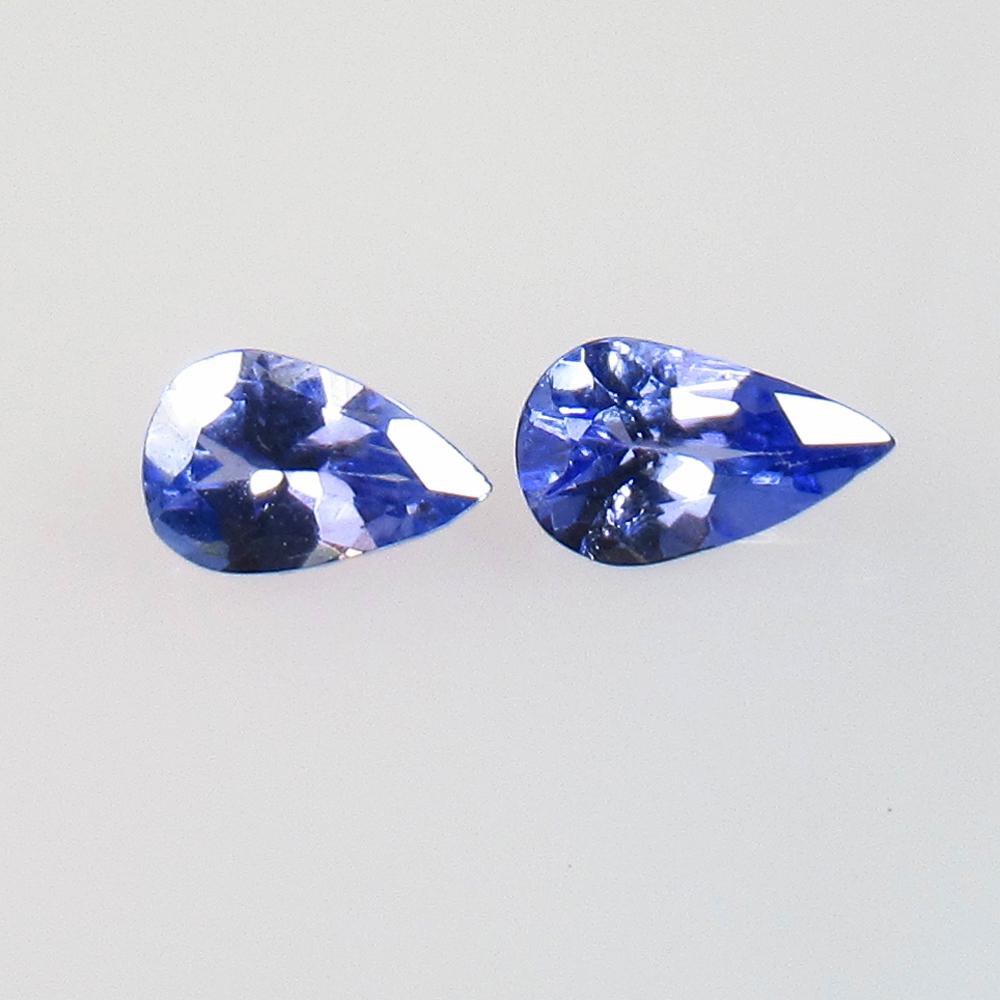 0.40 Ctw Natural Tanzanite Pear Pair: No Reserve! Title: 0.40 Ctw Natural Tanzanite Pear Pair Stone Clarity: VVS Gemstones: Natural Tanzanite Carat Weights: 0.4 Size/Dimensions: 5.20 x 3.20 x 2.20 mm / 2 Pc's Additional Information: Top Q