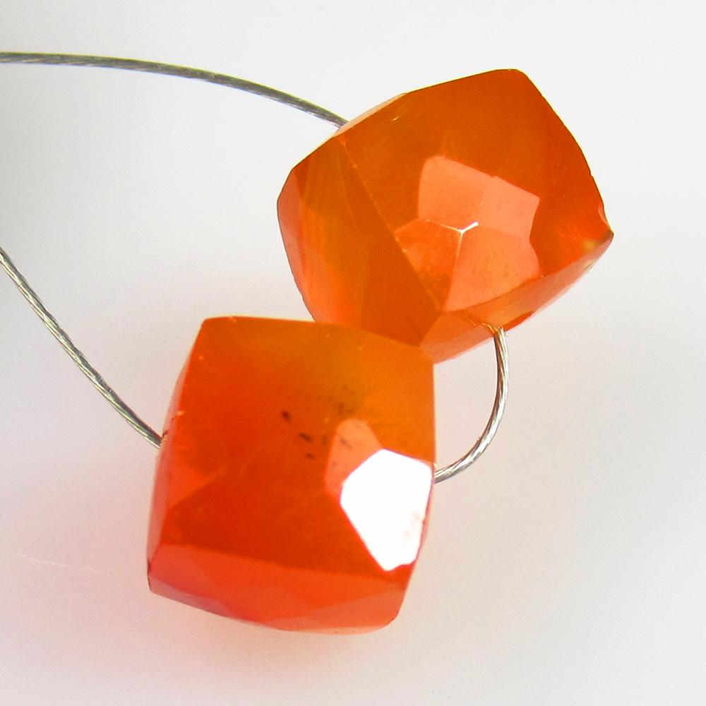 7.06 Ctw Natural 2 Drilled Orange Carnelian Square Beads: No Reserve! Title: 7.06 Ctw Natural 2 Drilled Orange Carnelian Square Beads Stone Clarity: Semi-Transparent Gemstones: Natural Carnelian Beads Carat Weights: 7.06 Size/Dimensions: 7.10 x 6.80 x 6.80 m