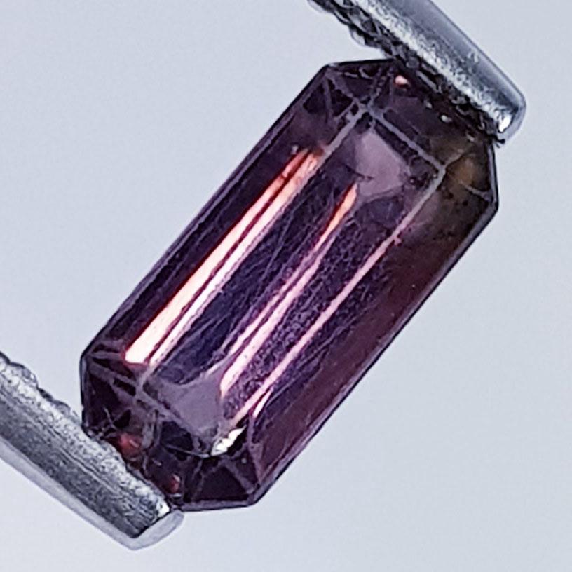 0.70 ctz " Collective Gem " Natural Mined Spinel: No Reserve! Title: 0.70 ctz " Collective Gem " Natural Mined Spinel Color/Clarity: Purple / VVS-VS Gemstones: Spinel Carat Weight: 0.7 Size/Dimension: 7.50 x 3.50 x 2.70 Additional Information: Octago
