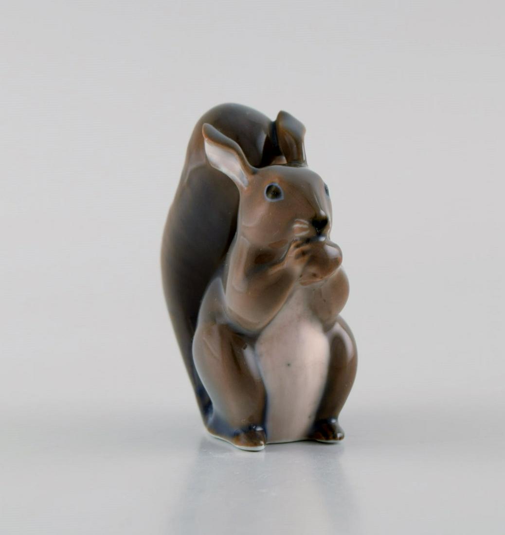 Royal Copenhagen porcelain figurine. Squirrel. Model number 982.: Royal Copenhagen porcelain figurine. Squirrel. Model number 982. Measures: 7 x 5.5 cm. In excellent condition. Stamped. 1st factory quality. Reserve: $95.00 Shipping: Domestic: Shipping rates are dete