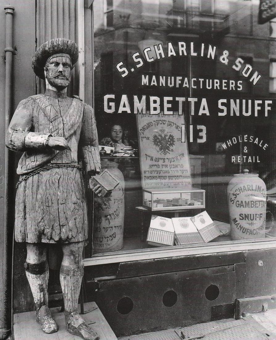 BERENICE ABBOTT- Snuff Shop,113 Division Street: Artist: BERENICE ABBOT Print Title: Snuff Shop,113 Division Street Medium: Photo-lithograph Printed in: Japan, 1982 Image Size: approx. 10 x 8.5” Berenice Abbott (1898 – 1991),was an Ameri
