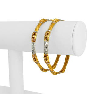 Pair of 22k Yellow Gold and Rhodium 27g Diamond Cut Bangle Bracelets 7.75": Details Condition: Excellent Condition, Professionally Cleaned and Polished Metal: 22k Gold (Marked, and Professionally Tested) Weight: 27g (combined weight) Length: 7.75 Inches Inner