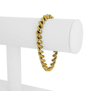 14k Yellow Gold 13.5g Brushed and Polished Link 7mm San Marco Link Bracelet 7": Details Condition: Excellent Condition, Professionally Cleaned and Polished Metal: 14k Gold (Marked, and Professionally Tested) Weight: 13.5g Length: 7 Inches Width: 7mm Closure: Box Tab Insert